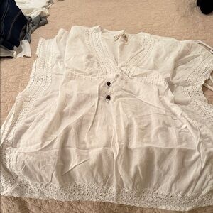 Tularosa White Lace-Trimmed swimsuit coverup
Brand new.  Never worn